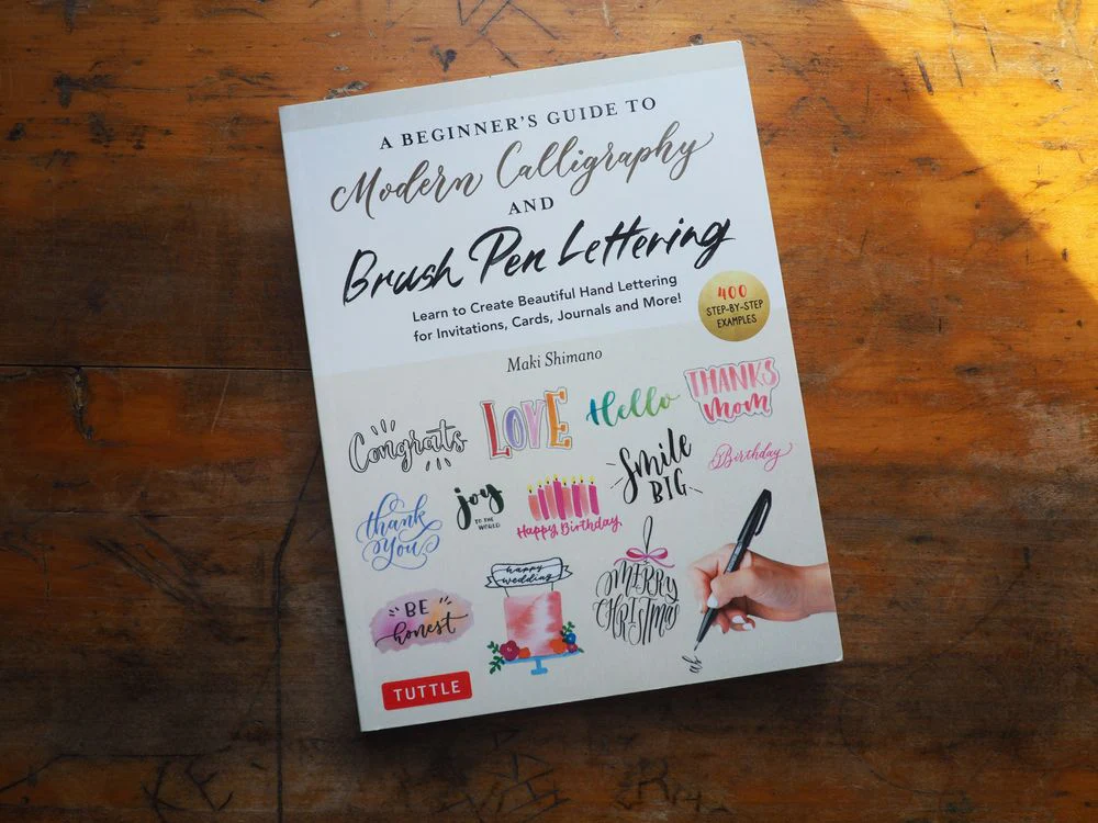 A Beginner's Guide to Modern Calligraphy & Brush Pen Lettering: Learn to Create Beautiful Hand Lettering for Invitations, Cards, Journals and More! (400 Step-by-Step Examples) by Maki Shimano