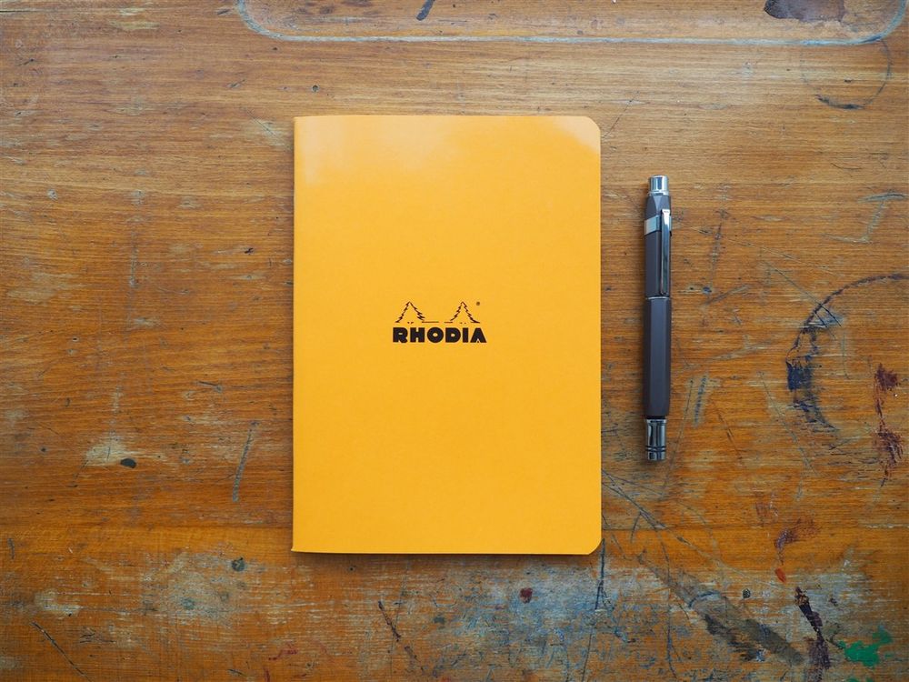 Rhodia - Side-Stapled Notebook - A5 - Orange (Graph)